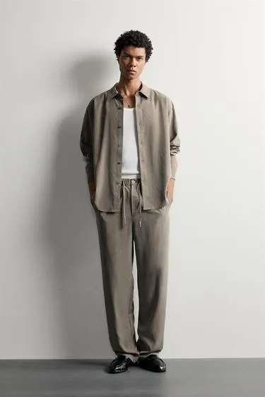 Струящиеся брюки Relaxed Fit