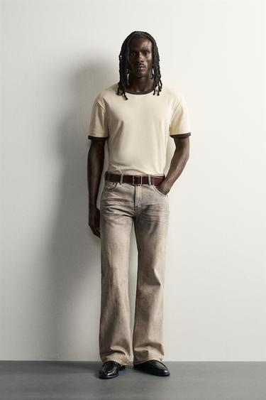 Джинсы Bootcut Low Rise с винтажным эффектом- Заказать в России