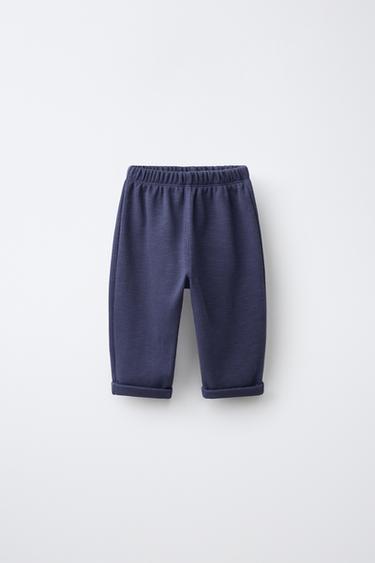 Zara Брюки с карманом и нашивкой
