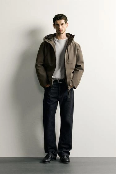 Water-repellent hooded technical jacket