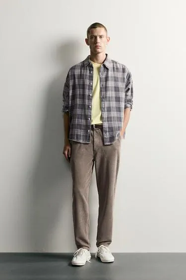 Брюки-каррот из хлопкового вельвета с эффектом стирки