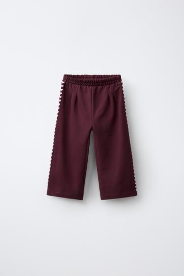 Zara Широкие плюшевые брюки с полосками и вышитыми сердечками