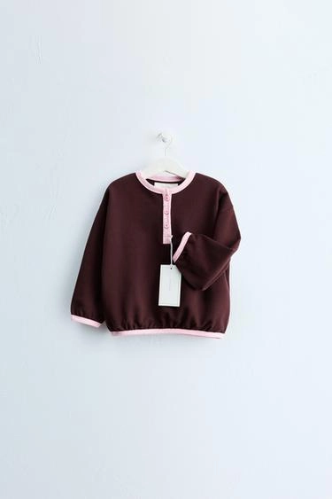 Оверсайз свитшот zara timeless с контрастной отделкой и пуговицами