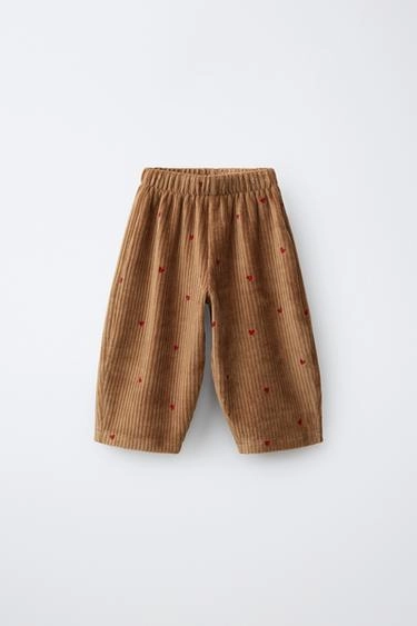 Corduroy balloon trousers with embroidered hearts- Заказать в России
