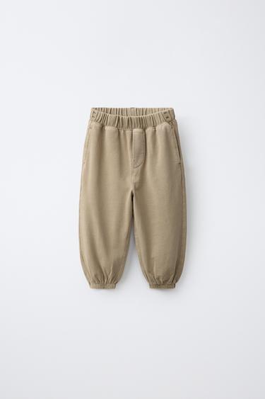 Zara Брюки-джоггеры песочного цвета купить с доставкой.