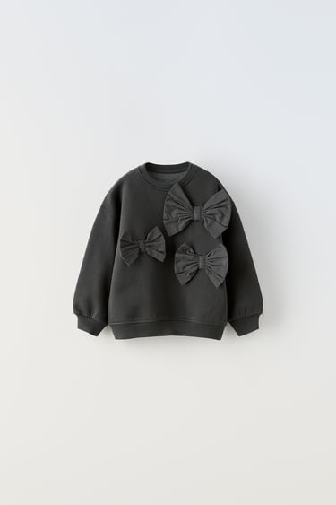 Толстовка с декоративными бантами- Заказать в России