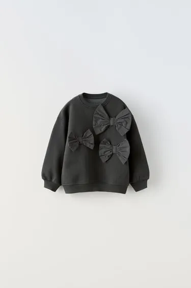 Толстовка с декоративными бантами- Заказать в России