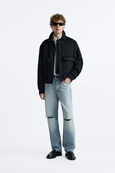 Рваные джинсы прямого кроя- Заказать в России