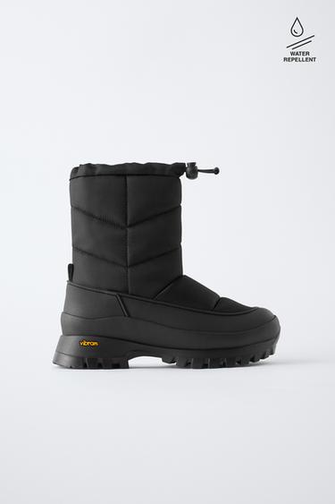 Водоотталкивающие стеганные ботинки коллекции лыжной обуви с подошвой от VIBRAM ®