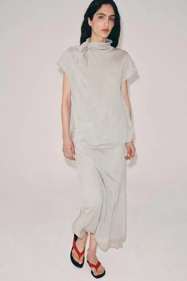 Юбка миди с волнистыми складками из вязаного материала