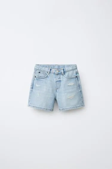 Джинсовые шорты бермуды свободного кроя с потертостями