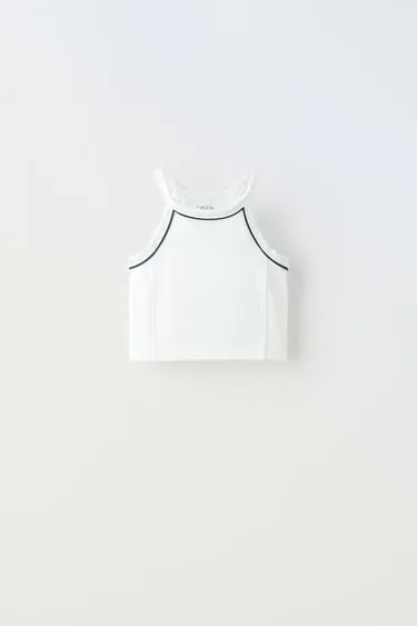 Топ из высокотехнологичной ткани с контрастной окантовкой