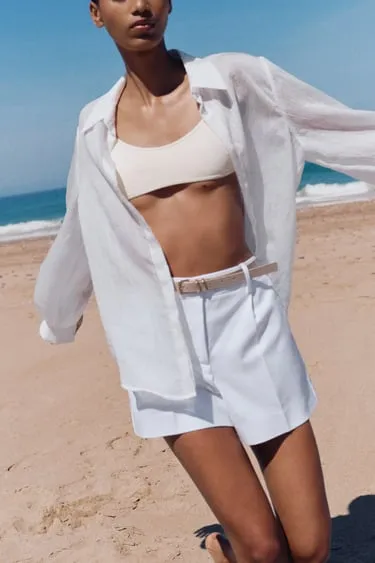 Шорты с ремнем и защипами- Заказать в России