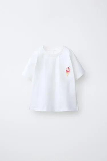 Футболка с прорезиненным аппликей- Заказать в России