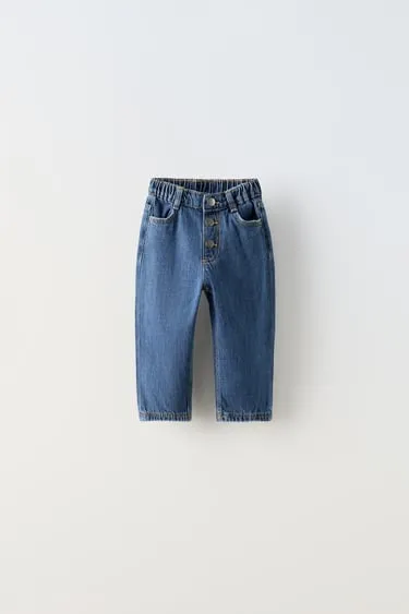 Джинсы с пуговицами- Заказать в России