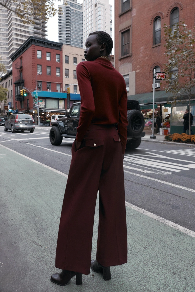 Поло из шерсти с карманом