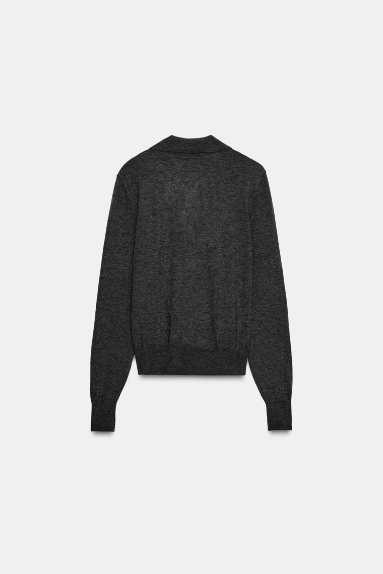 Поло из шерсти с карманом