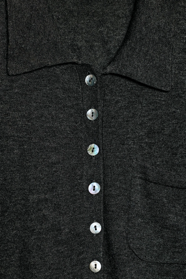 Поло из шерсти с карманом