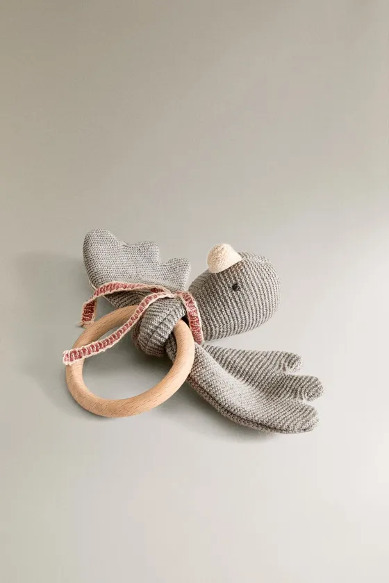 Детская игрушка-погремушка утенок