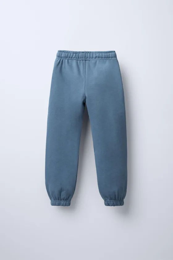 БРЮКИ С ВЫШИТОЙ НАДПИСЬЮ