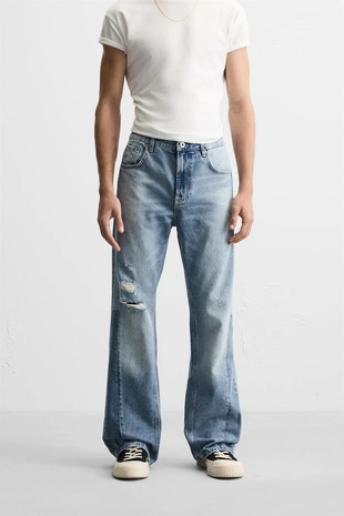 Расклешенные джинсы с разрезами