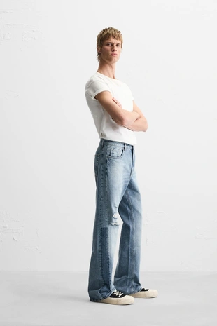 Расклешенные джинсы с разрезами