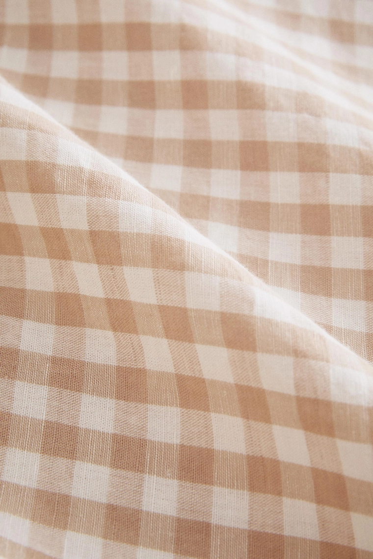 Детский нагрудный льняной простыней в клетку