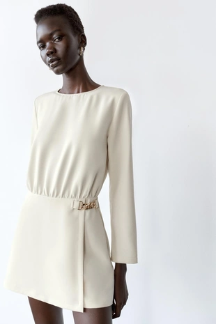 Комбинезон из крепа с золотистой цепочкой- Заказать в России