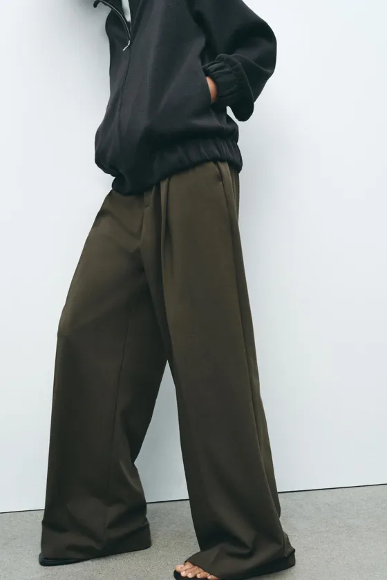 БРЮКИ С ЗАЩИПАМИ