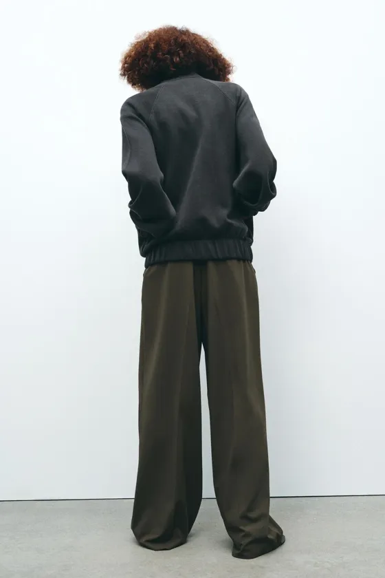 БРЮКИ С ЗАЩИПАМИ