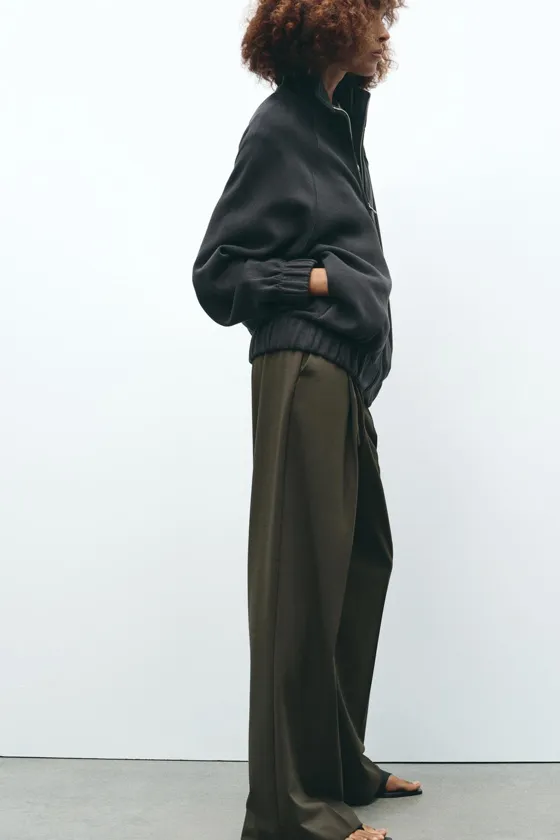 БРЮКИ С ЗАЩИПАМИ