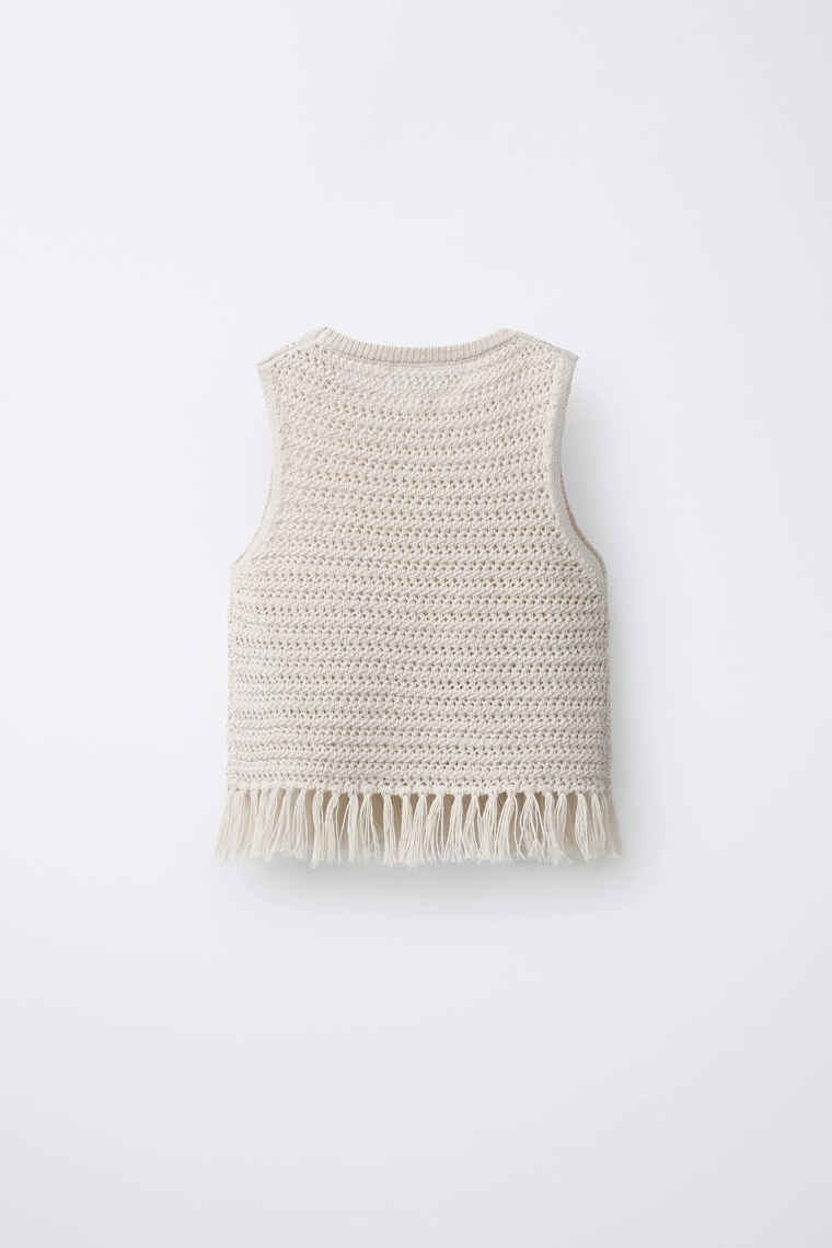 Топ с отделкой кисточками