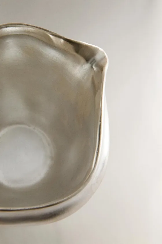 Декоративная керамическая и серебряная чаша