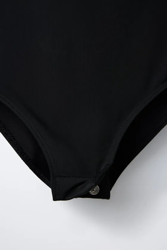 ОДНОТОННОЕ БОДИ С ГОРЛОВИНОЙ ХАЛТЕР