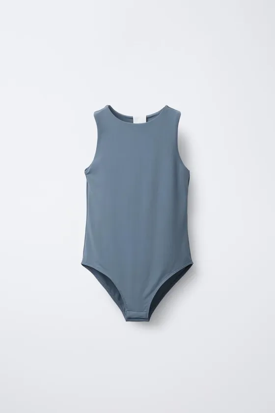 ОДНОТОННОЕ БОДИ С ГОРЛОВИНОЙ ХАЛТЕР