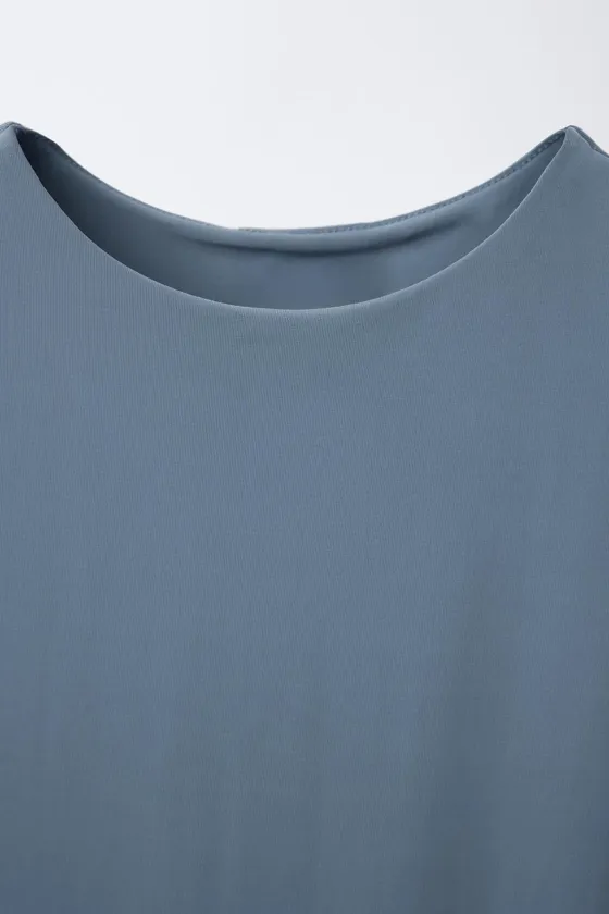 ОДНОТОННОЕ БОДИ С ГОРЛОВИНОЙ ХАЛТЕР