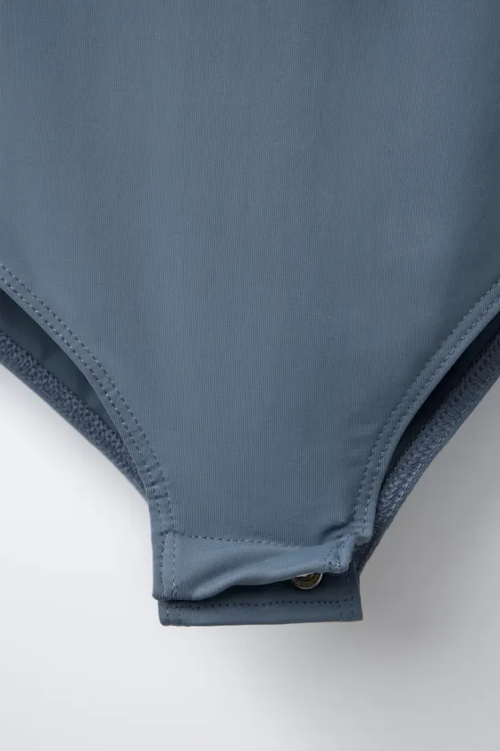 ОДНОТОННОЕ БОДИ С ГОРЛОВИНОЙ ХАЛТЕР