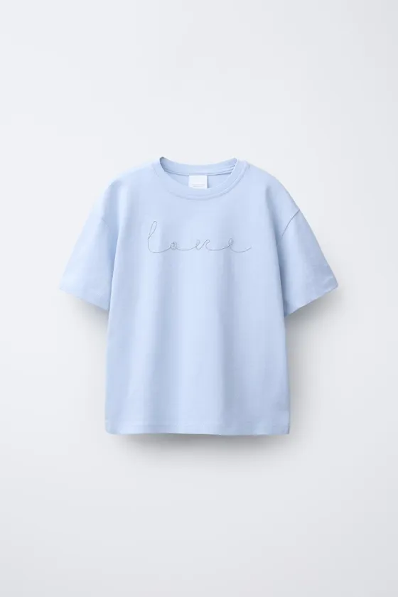 ФУТБОЛКА С ЦВЕТОЧНЫМ ПРИНТОМ И БУСИНАМИ