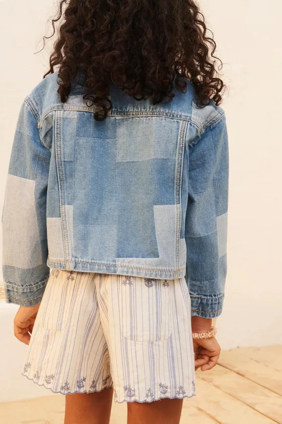 Джинсы-бермуды limited edition в полоску с вышивкой