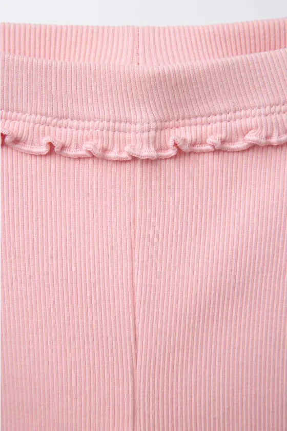 НАБОР ИЗ 2 ЛЕГИНСОВ В РУБЧИК С ЦВЕТОЧНЫМ ПРИНТОМ