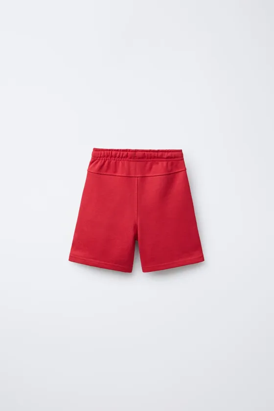 ШОРТЫ ИЗ МЯГКОЙ ТКАНИ С РЕЛЬЕФНОЙ НАДПИСЬЮ