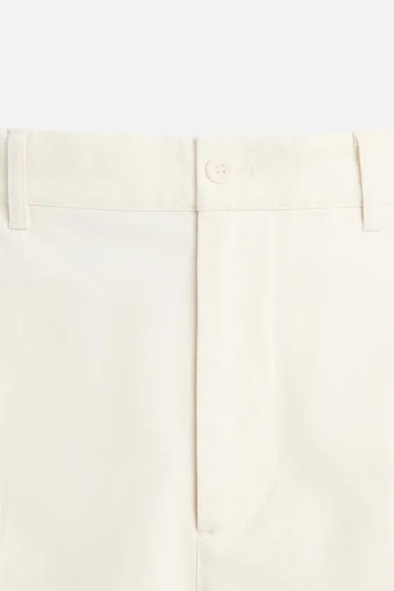 БРЮКИ REGULAR FIT В ЕЛОЧКУ