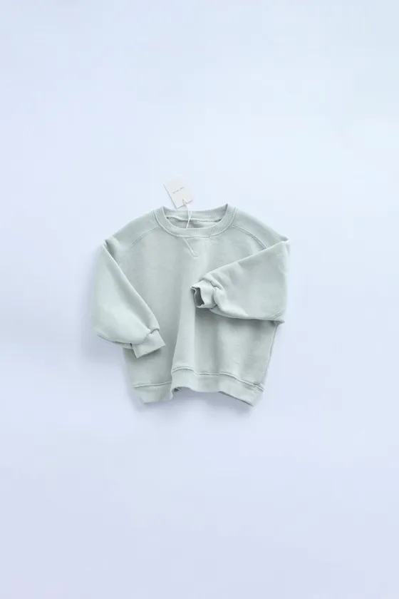 TIMELESZ - ОДНОТОННАЯ ТОЛСТОВКА С ДЕТАЛЬЮ