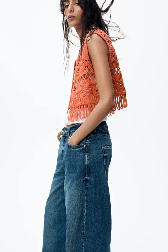 ТРИКОТАЖНЫЙ ЖИЛЕТ С БАХРОМОЙ