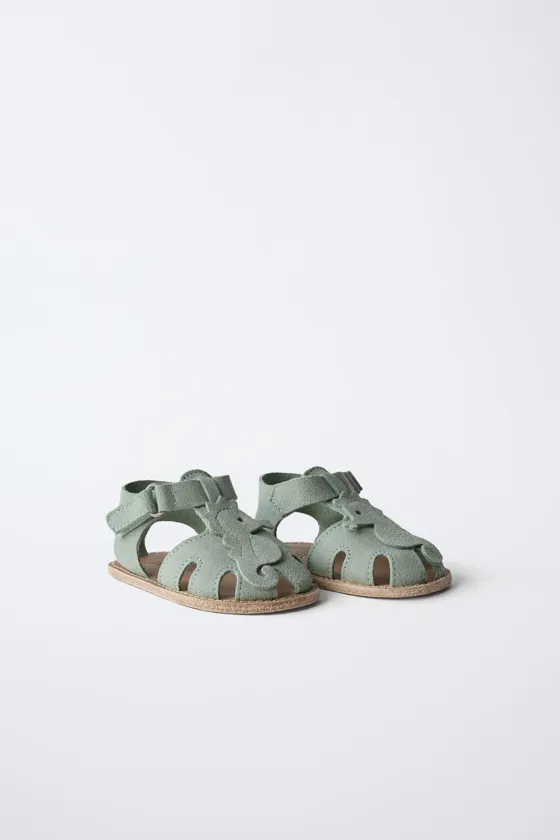 Leather sandals with seahorse