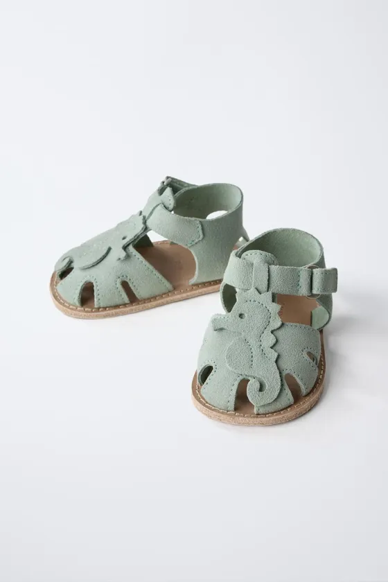 Leather sandals with seahorse