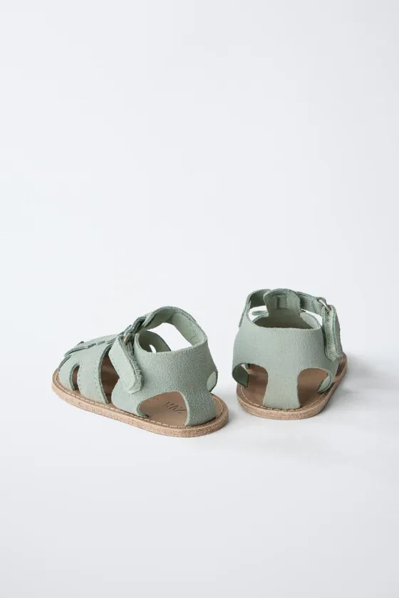 Leather sandals with seahorse