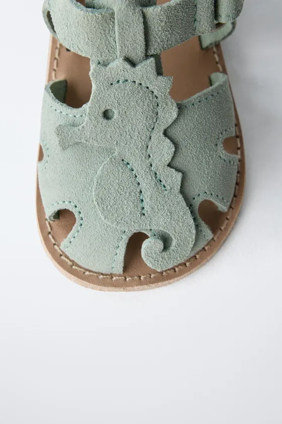 Leather sandals with seahorse