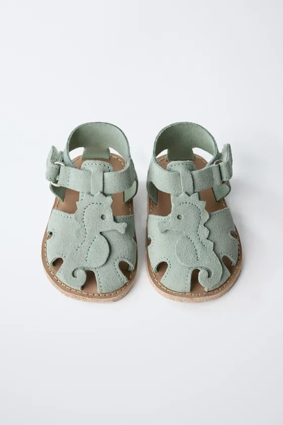 Leather sandals with seahorse