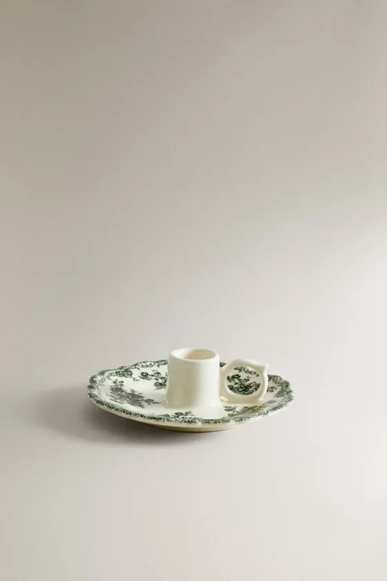 глиняный подсвечник с цветочным рисунком
